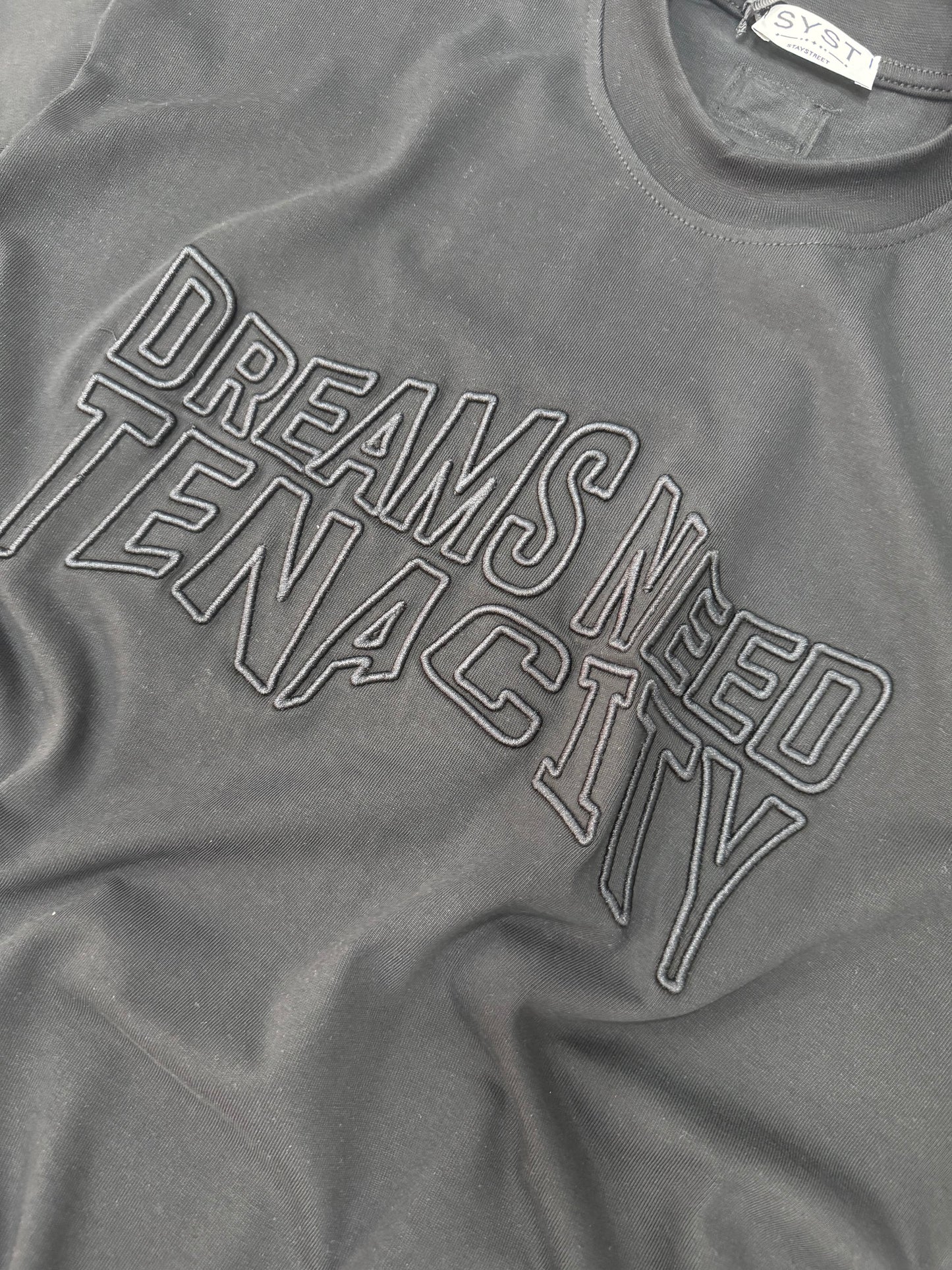 DREAMS NEED TENACITY BLACK TEE