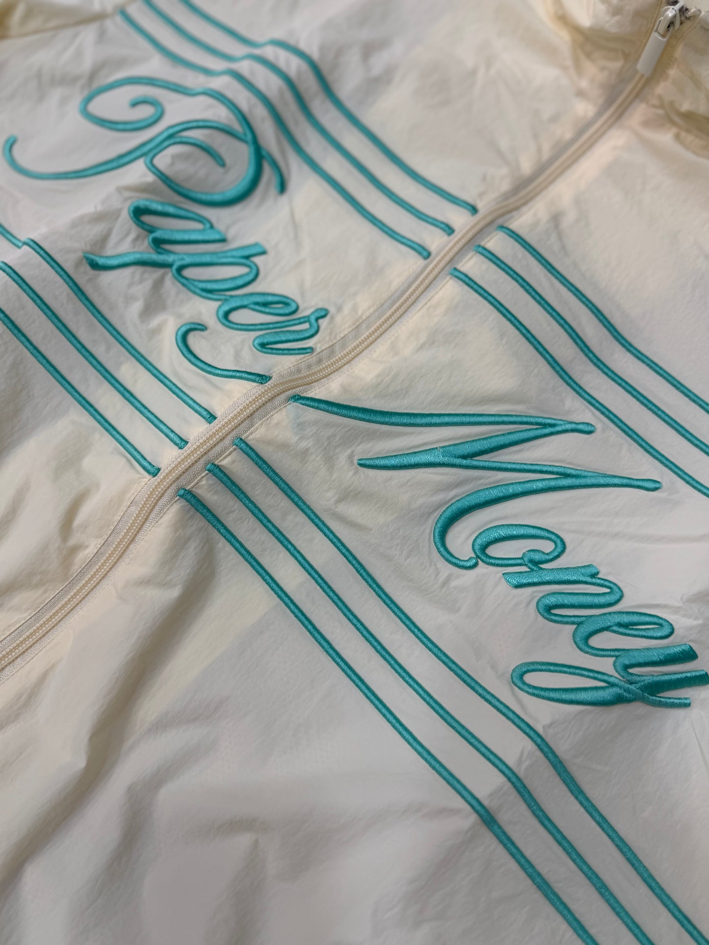 TRACKSUIT RAGS TO RICHES CREAM PAPER MONEY