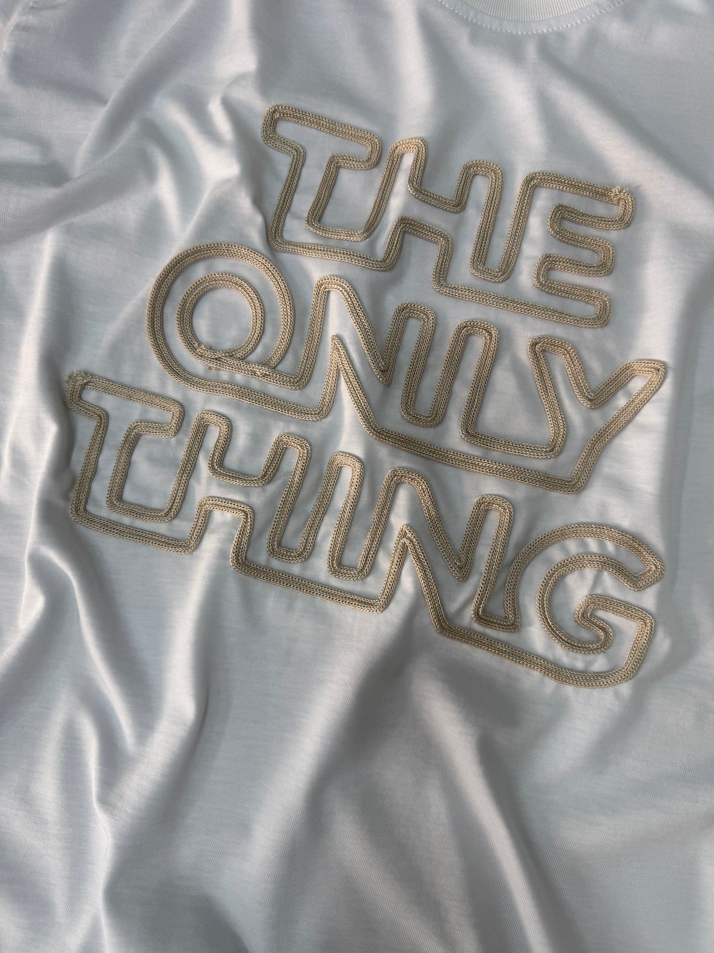 THE ONLY THING WHITE TEE
