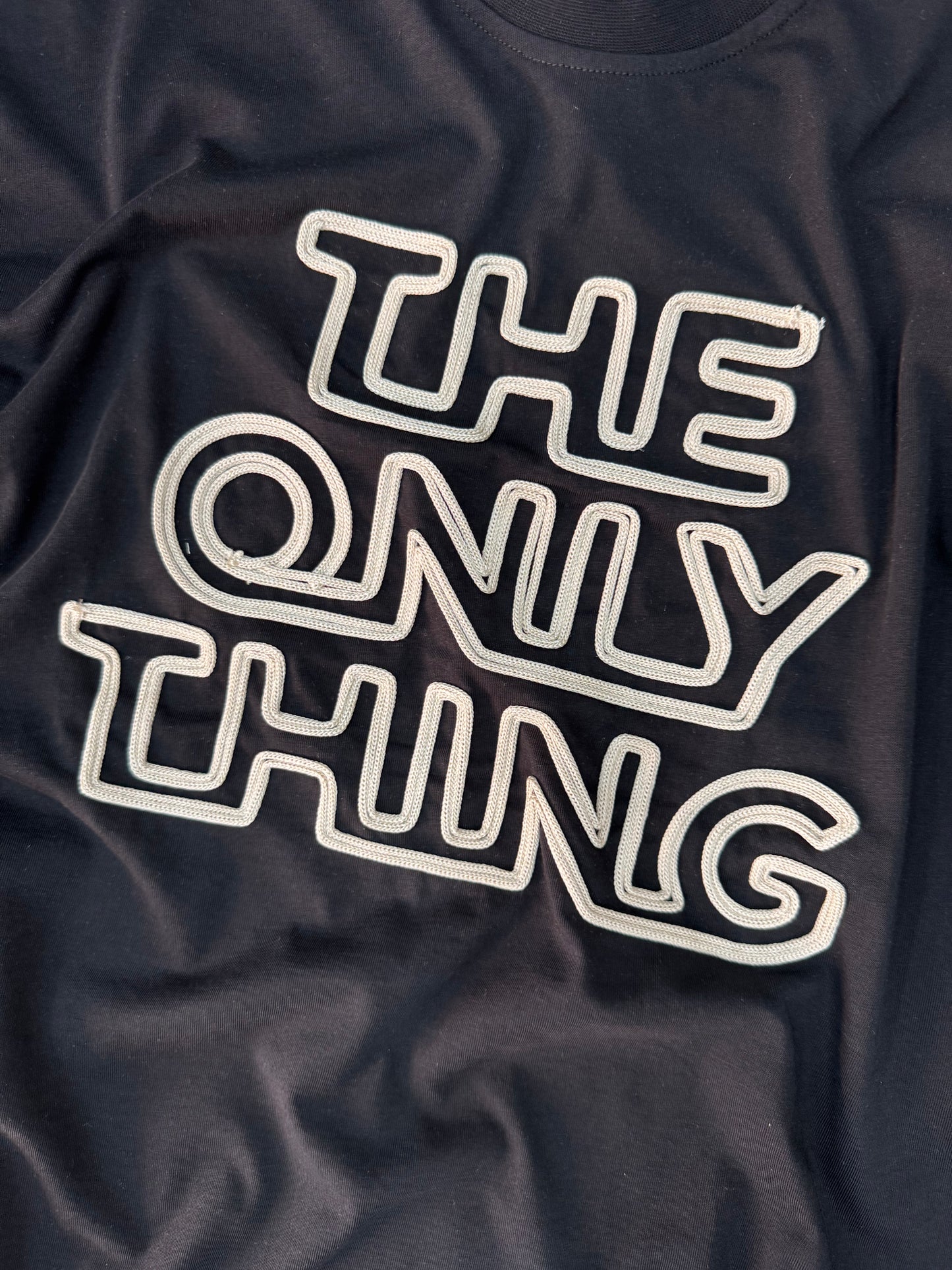 THE ONLY THING BLACK SHIRT